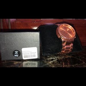 Claire’s rose gold stainless steel watch